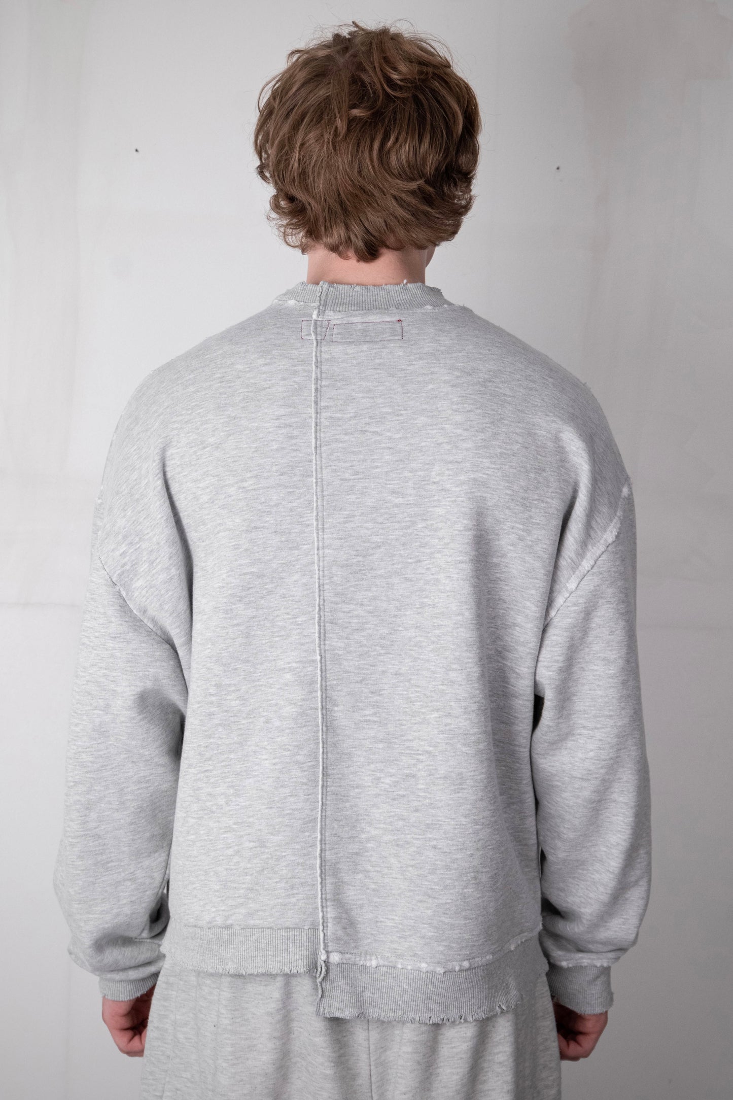 DECONSTRUCTED ARMY SWEATER