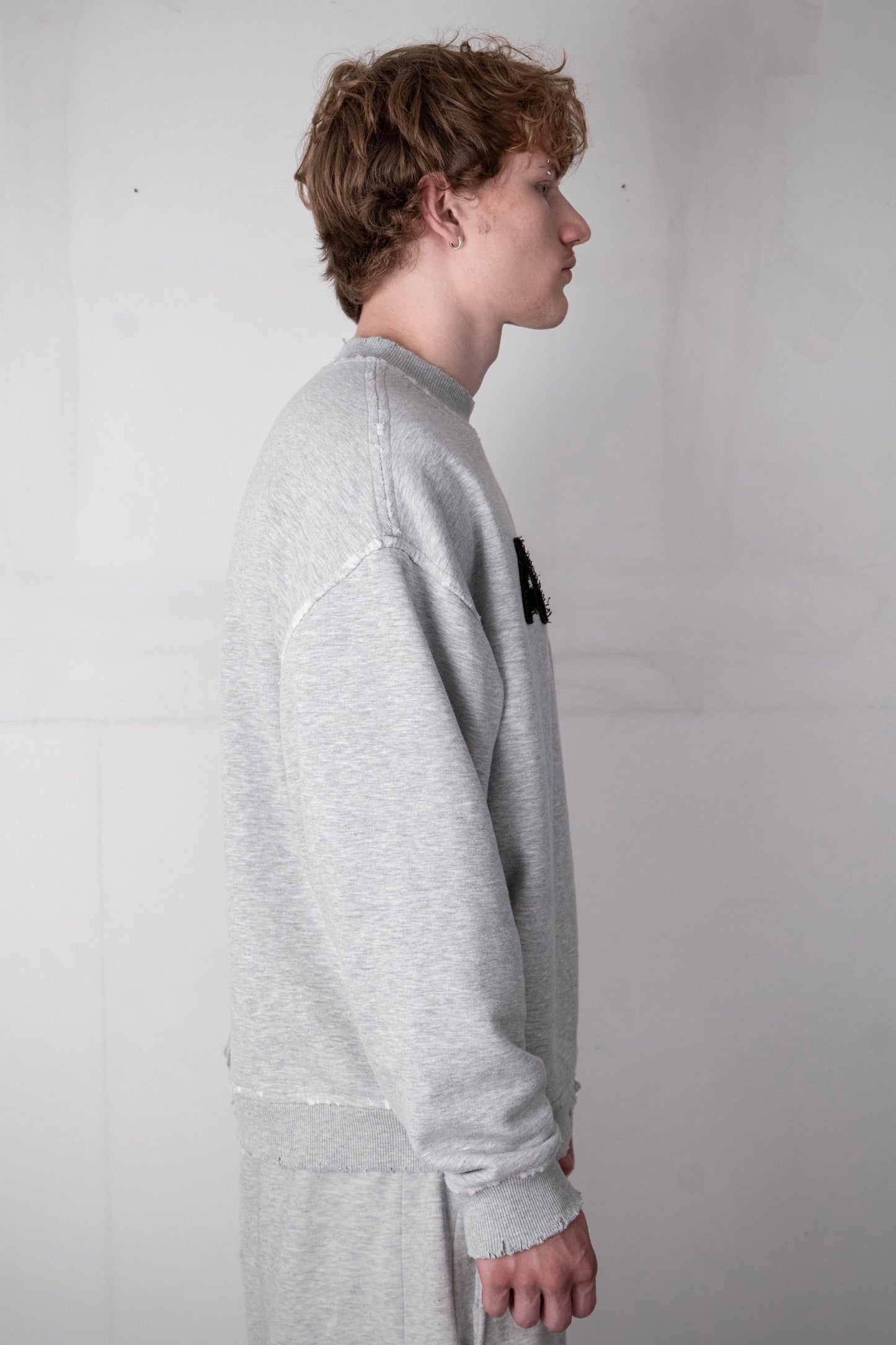DECONSTRUCTED ARMY SWEATER